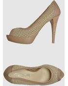 Innue' Pumps with Open Toe - Lyst
