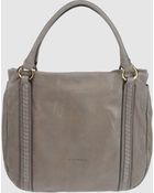 Coccinelle Large Leather Bags - Lyst