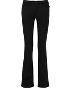 Theyskens' Theory Low-rise Flared Jeans - Lyst