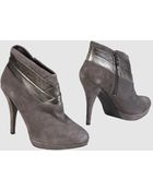 Guess Shoe Boots - Lyst