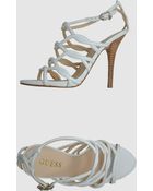 Guess High Heeled Sandals - Lyst