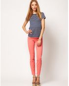 J Brand J Brand 811 Mid Rise Skinny Ankle Jean in Coral - Lyst
