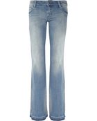MICHAEL Michael Kors Low Rise Flared Jeans - Lyst