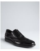Tod's Black Patent Leather Wingtip Oxfords - Lyst