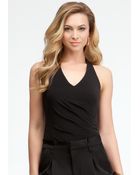 Bebe Silk Halter Bodysuit - Lyst