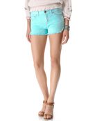 Free People Dolphin Hem Cutoff Shorts - Lyst
