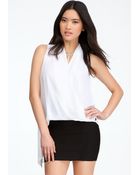 Bebe Asymmetric Wrap Hem Top - Lyst