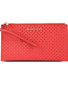 Michael Kors Jet Set Perforatedleather Clutch - Lyst