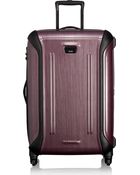 Tumi Vapor medium four-wheel suitcase 71cm - Lyst