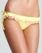 Pilyq Pom Pom Side Tie Bikini Bottom - Lyst