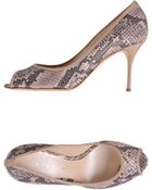 Casadei Pumps with Open Toe - Lyst