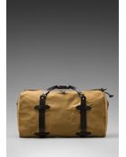 Filson Medium Duffle In Tan - Lyst
