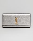 Saint Laurent Cassandre Metallic Logo Clutch Bag - Lyst