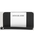 MICHAEL Michael Kors Tech Wristlet Slim - Lyst