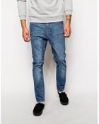 Cheap Monday Dropped Tapered Fit Jeans In Washed Blue - Lyst