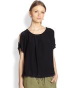 Joie Nimah Silk Cutout-Shoulder Blouse - Lyst