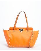 Valentino Orange Leather Rockstud Small Convertible Tote - Lyst