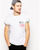 Asos T-Shirt With Flower Print Pocket And Printed Roll Sleeve - Lyst