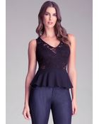 Bebe Lace Block Peplum Top - Lyst
