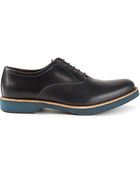 Pollini Contrasting Sole Oxfords Shoes - Lyst