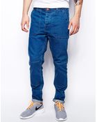 Asos Tapered Jeans With Skater Design Detail - Lyst