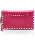Valentino Preowned Pink Leather Rockstud Clutch - Lyst