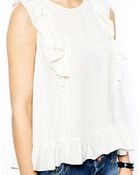 Asos Sleeveless Ruffle Peplum Top - Lyst