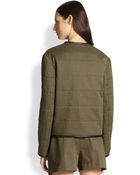 Alexander Wang Leather-Trimmed Distressed Puffer Jacket - Lyst