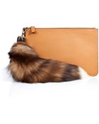 Emilio Pucci Leather Clutch With Fox Tassel - Lyst