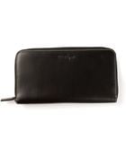 Ferragamo Zip Around Purse - Lyst
