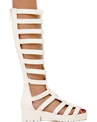Akira Caged Tall Gladiator Sandal in White in White | Lyst Akira Caged Tall Gladiator Sandal in White in White | Lyst