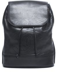 Chanel Pre-Owned Black Lambskin Cc Backpack - Lyst
