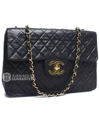 Chanel Pre-Owned Black Lambskin Maxi Single Flap Bag - Lyst