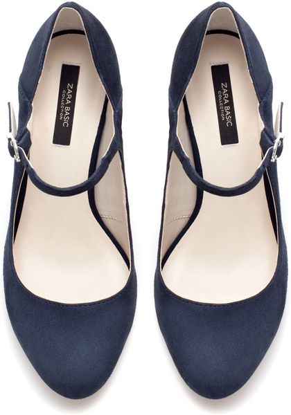 blue high heel court shoes