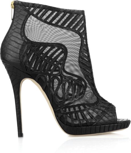 black boots with snakeskin heel