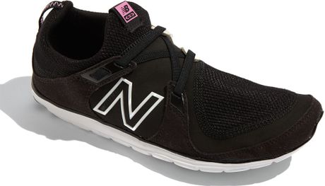 www.lyst.com/shoes/new-balance-black-minimus-walking-shoe-women