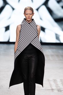 Gareth Pugh Spring 2012 Black And White Long Asymmetric Sleeveless Coat With High Collar - Lyst