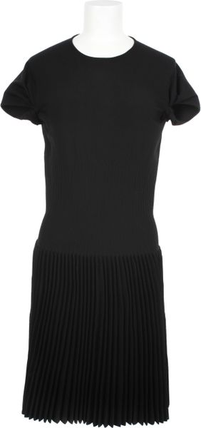 Alaïa Fitted Knit Dress in Virgin Wool and Polyester in Black - Lyst