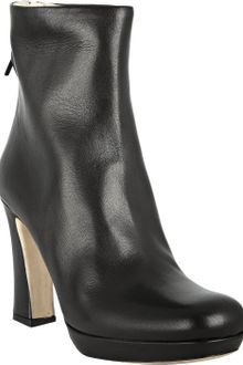 Miu Miu Black Leather Back Zip Ankle Boots - Lyst