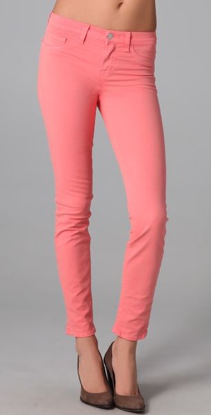 J Brand 811 Mid Rise Skinny Jeans in Pink (coral) - Lyst