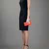 Rocio Leather Covered Wooden Clutch Bag in Orange - Lyst
