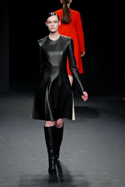 Calvin Klein Fall 2012 Black Leather KneeLength Dress with White Leather Panels on the Sides in Black - Lyst