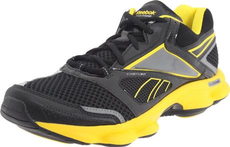 black and yellow reebok shoes