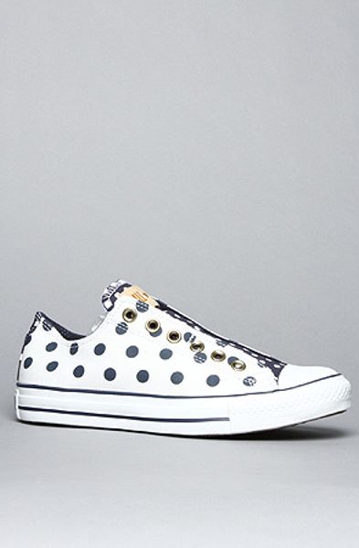 navy blue and white polka dot converse