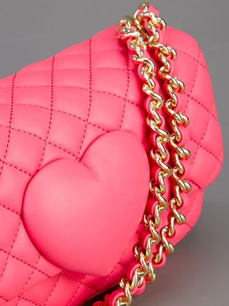 pink quilted bag with chain