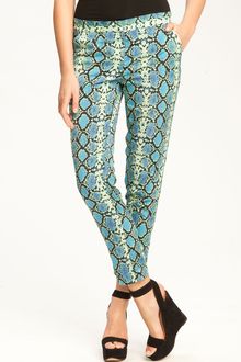 BCBGMAXAZRIA Snake Print Slim Leg Pants - Lyst
