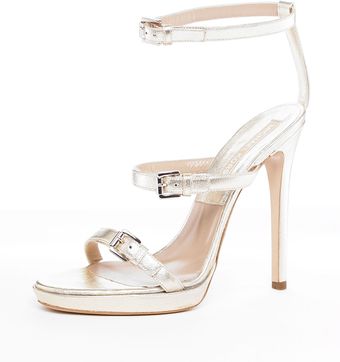 Michael Kors Triple Buckle Sandal, Platinum - Lyst