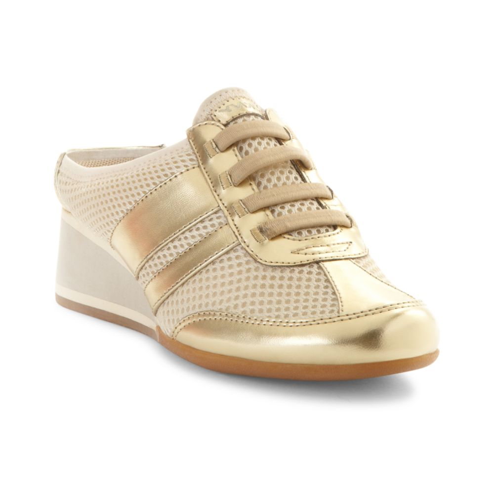 Dkny Remedy Mule Wedges in Gold (newspaper gold) | Lyst