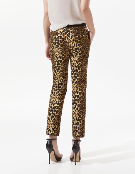 white leopard print trousers