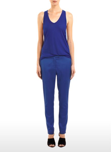 Alexander Wang Cropped Stretch Viscose Cupro Twill Trousers in Blue (indigo) - Lyst